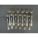 A set of twelve continental silver coloured metal forks with hatched shell scroll terminals, all