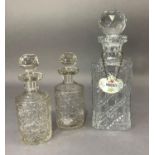 A hobnail cut spirit decanter with facetted stopper and china whisky label together with two