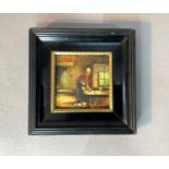 A framed tile painted with a woman in a kitchen interior, signed Brink, 12.5cm x12.5cm