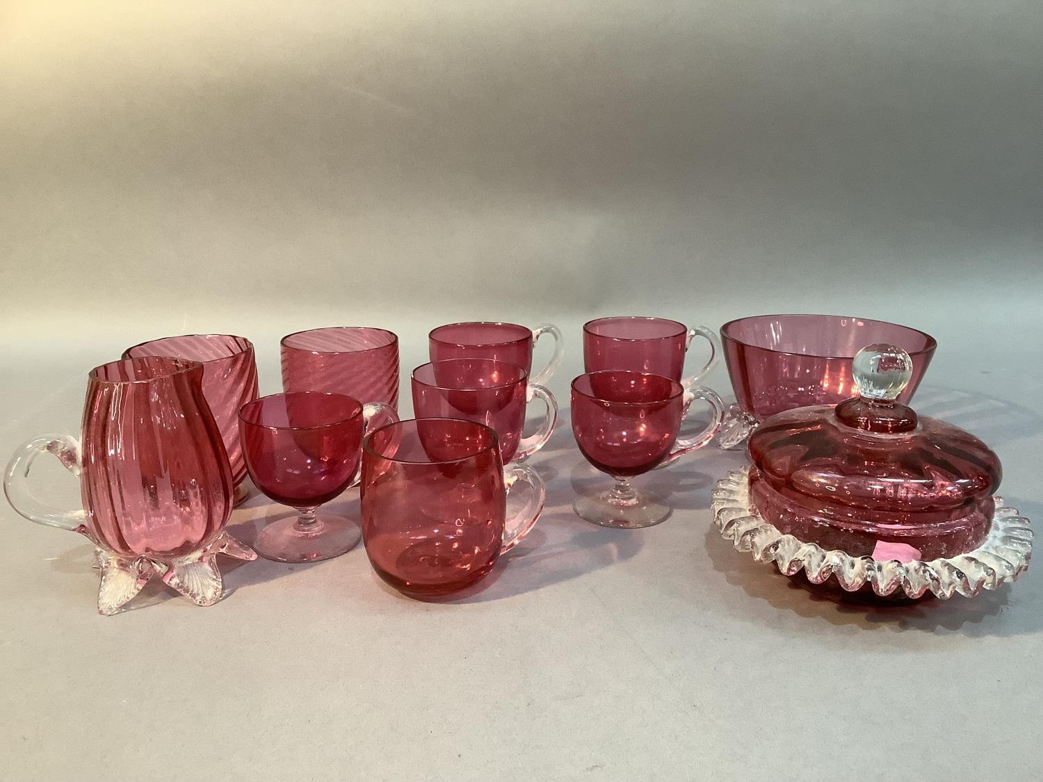 A collection of cranberry glass including five custard cups, pair of beakers, cream jug, sugar bowl, - Image 2 of 2