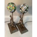 A pair of reproduction bronzed resin lamps in Art Deco style modelled as semi clad kneeling women