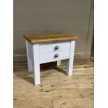 A reproduction oak topped table fitted one deep drawer as two with pewter handles, the under frame