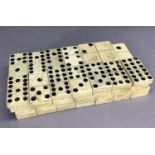 A set of vintage bone dominoes