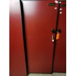 A Eurocave Confort wine fridge, freestanding, red with three adjustable wooden shelves, each for