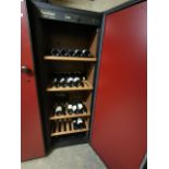 A Eurocave Confort wine fridge, freestanding, red with four adjustable wooden shelves, each for