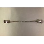 A LATE VICTORIAN SILVER LADLE with 2.5cm diameter bowl, spiral twist long stem, 24cm high, by Walker