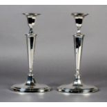 A PAIR OF GEORGE III STYLE NEO-CLASSICAL SILVER TABLE CANDLESTICKS of panelled oval form,