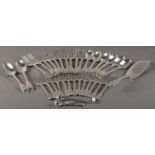 A COMPOSITE SET OF SILVER FIDDLE AND THREAD PATTERN TABLE CUTLERY, primarily William IV and