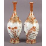 A PAIR OF KUTANI WARE BALUSTER SHAPED BOTTLE VASES, the bodies finely painted with finches,