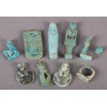 A SMALL COLLECTION OF EGYPTIAN POTTERY ASHABTI, a figure of Horus, scarab seal, two sphinx type