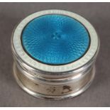 A GEORGE V SILVER AND ENAMEL PILL BOX, of circular outline, the pull-off lid enamelled in blue