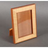 DAVID LINLEY (b.1961), A SATIN BIRCH AND WALNUT PHOTOGRAPH FRAME, rectangular, 20.5cm x 16cm