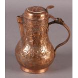 A SMALL LATE 17TH CENTURY GERMAN COPPER LIDDED TANKARD, the shallow dome top hinged lid with