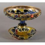 AN ART DECO STYLE ENAMELLED GLASS COMBINATION CANDLE STICK AND TAZZA with mushroom shaped