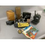 A Kodak 8 model 20 cine camera and leather case, a Western exposure metre and case, Photax camera,