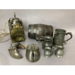 Three pewter measures and a fourth converted to a jug together with a wooden spirit barrel and three