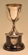 Hallmarked silver golfing trophy cup with crossed club design to front, on original black stand with