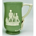 Spode Copeland Golfing Tankard: green tankard with white relief golfing figures and handle, height