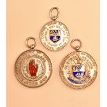 3 hallmarked silver and enamel Golfing Union of Ireland Ulster fobs incl Ulster Cup, hallmarked