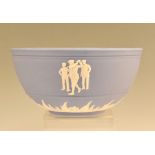 Wedgwood Blue Jasperware Golfer Bowl with trio of golfers to body, with leaf design base, 19cm