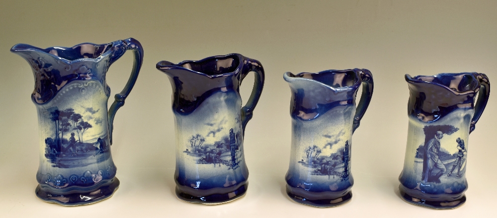 Group of 4 late 20th century Crown Devon Golfing Scene Jugs each in flow blue glaze titled Two heads