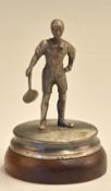 White Metal Tennis Figurine on circular base with wooden plinth, measures 12cm H, depicts male