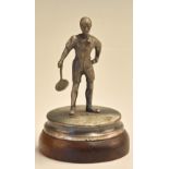 White Metal Tennis Figurine on circular base with wooden plinth, measures 12cm H, depicts male