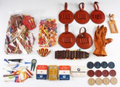 Large collection of various golf tees, leather tee bag holders, golf chips, period golf ball cleaner