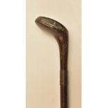 Dark stained Sunday golf walking stick fitted with golf club handle with rear lead back weight,