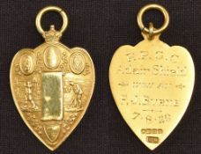 18ct gold fob with golfing design with highly decorative front, engraved to rear ‘R.P.G.C. Adair