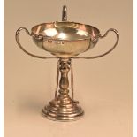 Hallmarked silver golf cup having 3 handles on a 3 club pedestal, hallmarked Birmingham 1956 with