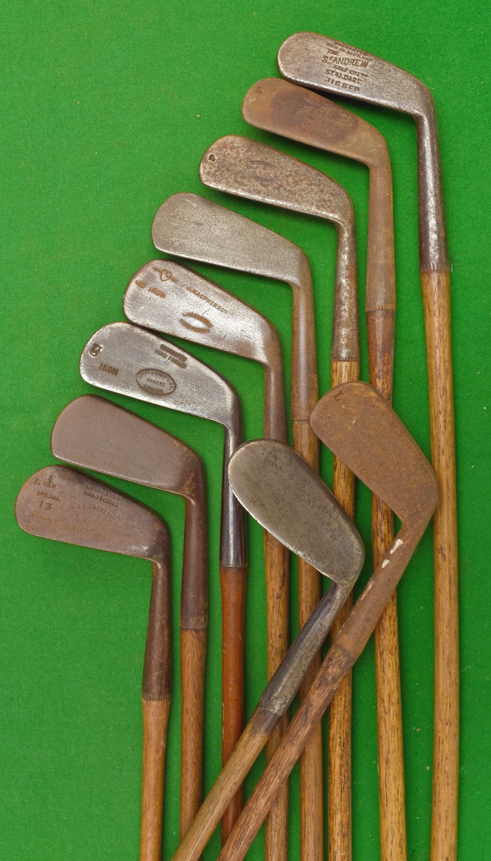 10x various irons – mashie niblick , jigger, lofting iron, mashies and a mid- iron – by Army and