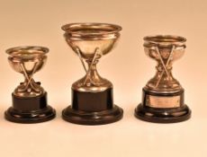 Group of 3x hallmarked silver golfing cups with stands each having crossed club designs, two
