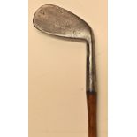 Interesting Tom Stewart Celtic style driving iron - elliptical shape and stamped Harry Brown