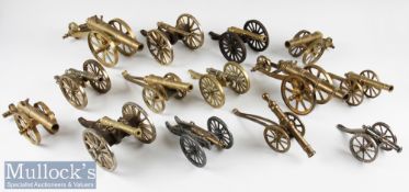 Collection of 18th century Style Brass Cannons 2 with wooden bases, 1 with iron base and 2 with
