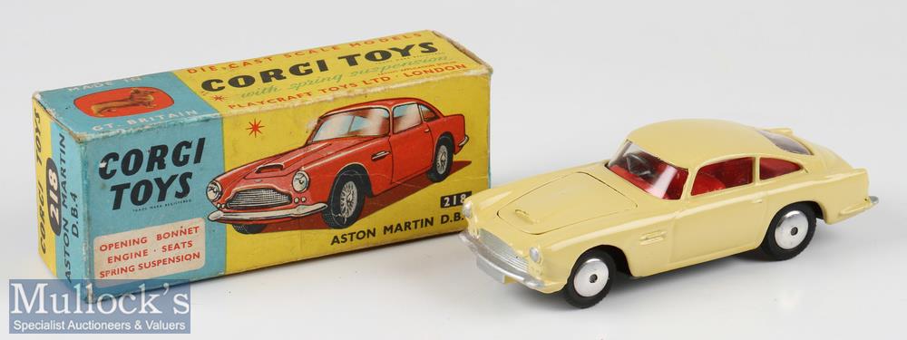 Corgi Toys Diecast 218 Aston Martin DB4 in cream with red interior, boxed, good condition with small