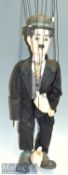 Charlie Chaplin Wood and Plaster Marionette in traditional black suit, waistcoat and tie with wooden