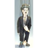 Charlie Chaplin Wood and Plaster Marionette in traditional black suit, waistcoat and tie with wooden