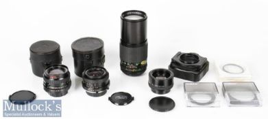Various camera lenses to include Carl Zeiss Jena f=28mm 1:2.8, Vivitar Auto Telephoto 300mm 1:5.6