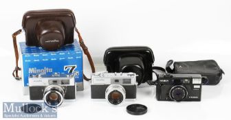 Minolta Hi-Matic 7 SLR camera marked 392453 to top, with a Minolta Rokkor 1:1.8 f=45mm lens and