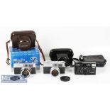 Minolta Hi-Matic 7 SLR camera marked 392453 to top, with a Minolta Rokkor 1:1.8 f=45mm lens and