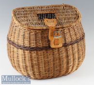 Large pot bellied wicker fishing creel with slot to lid, tan leather strap with buckle, back hinge