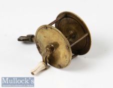 Early 19th century 2 ¼” all brass spike winch reel with a four pillar construction, white curved