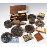 Selection of black japanned cast tins with a weight tin included, all circular in shape, two with