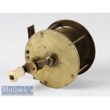 Unusual unnamed 3 ½” all brass reel with folding crank wind handle no maker’s marks, ivory/bone