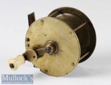 Unusual unnamed 3 ½” all brass reel with folding crank wind handle no maker’s marks, ivory/bone