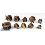 Selection of 8x assorted brass fly reels in varying sizes, plus 2x Nottingham wooden reels with star