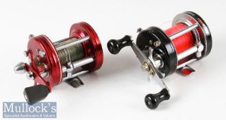 Abu Ambassadeur 6000 multiplier reel in red and chrome construction marked 080701 level wind,