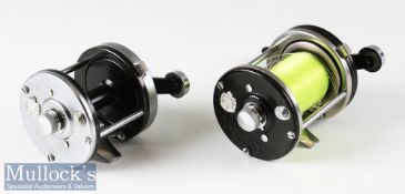 2x Abu Ambassadeur multiplier reels to include 10000C model in black and chrome, marked 731100