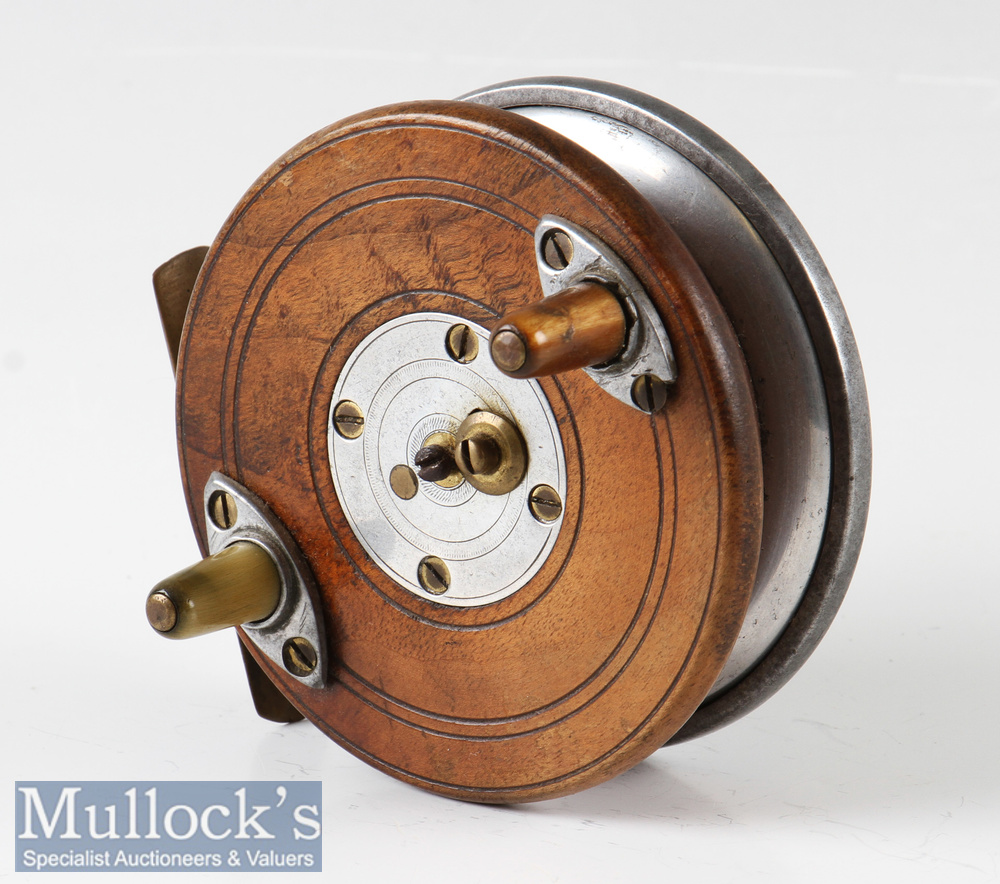 Mahogany and Alloy Combination Centrepin Reel 3 ½” dia, twin horn handles, brass star back and